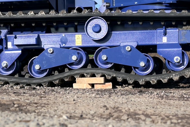 Pivoting track rollers